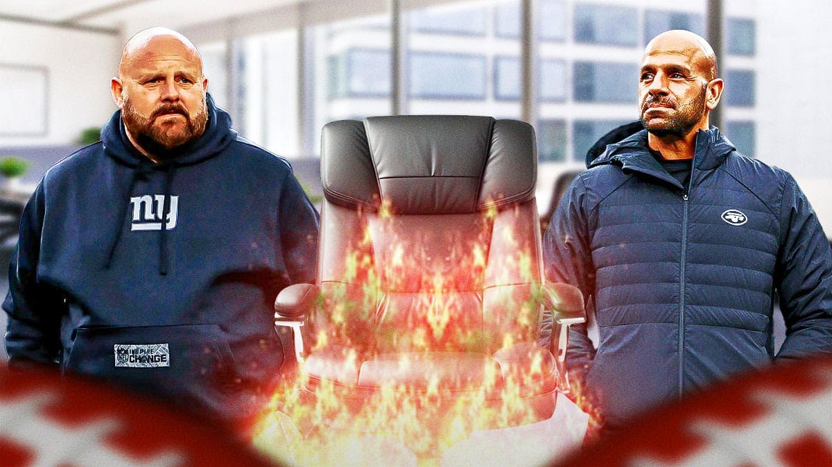 New York Giants head coach Brian Daboll and New York Jets head coach Robert Saleh with a flaming chair between them