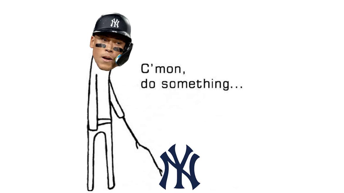 Aaron Judge in the come on do something meme while pointing the stick at the Yankees logo