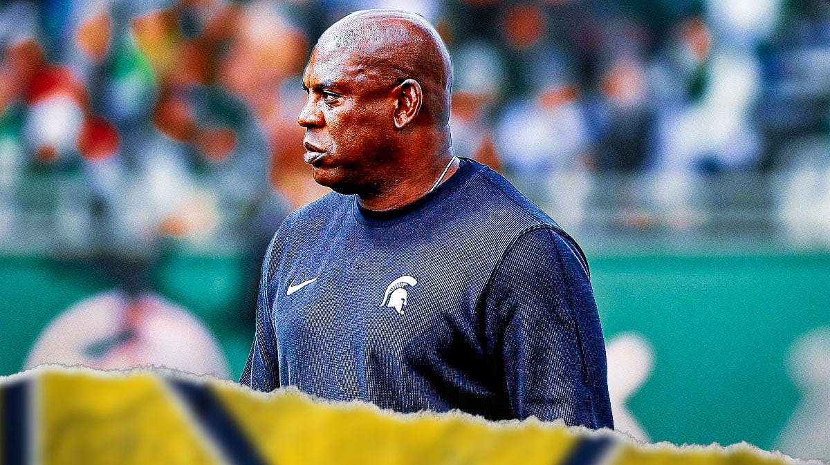 Mel Tucker, Mel Tucker lawsuit, Mel Tucker Michigan State, Michigan State football, Spartans, Mel Tucker with Michigan State football stadium in the background