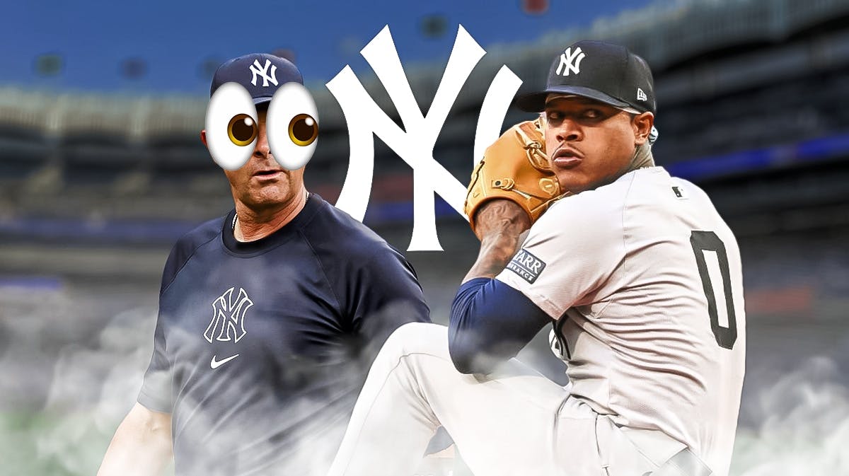 Yankees Aaron Boone with emojis in his eyes looking at Marcus Stroman