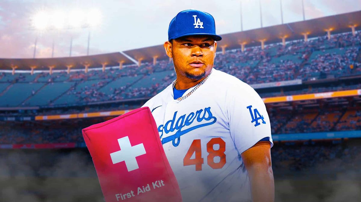 Dodgers reliever Brusdar Graterol with medical kit in front of him