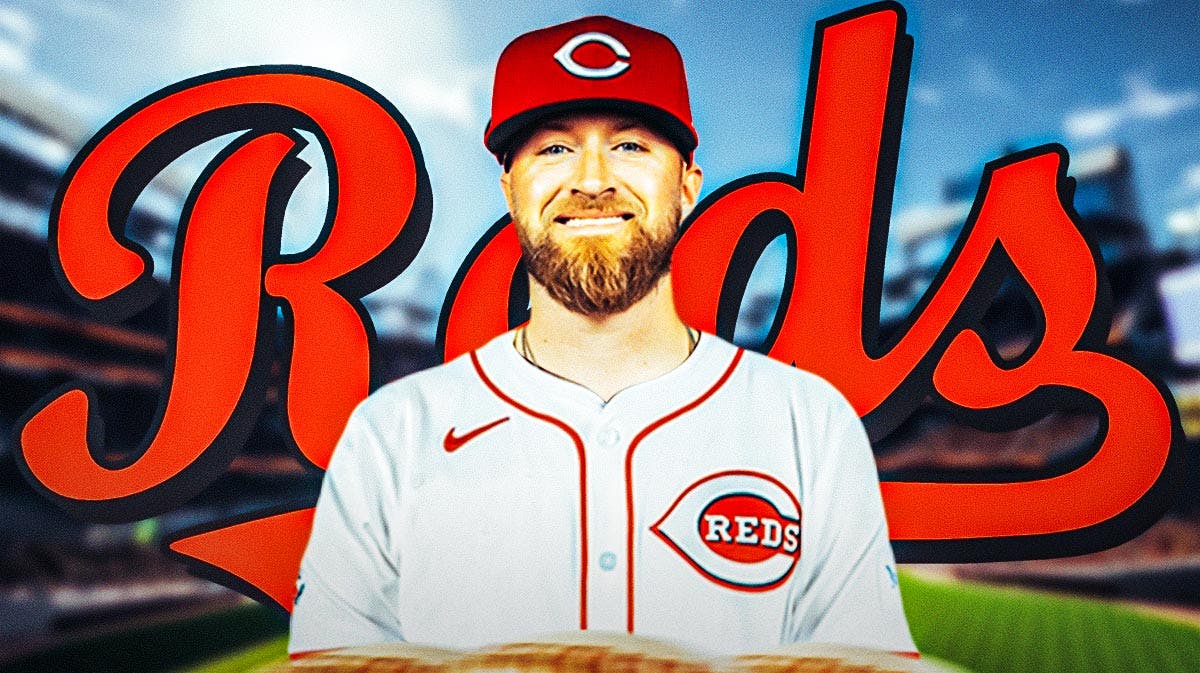 Tucker Barnhart in a Cincinnati Reds uniform with the Reds logo in the image as the Reds signed the catcher Barnhart to a minor league deal.