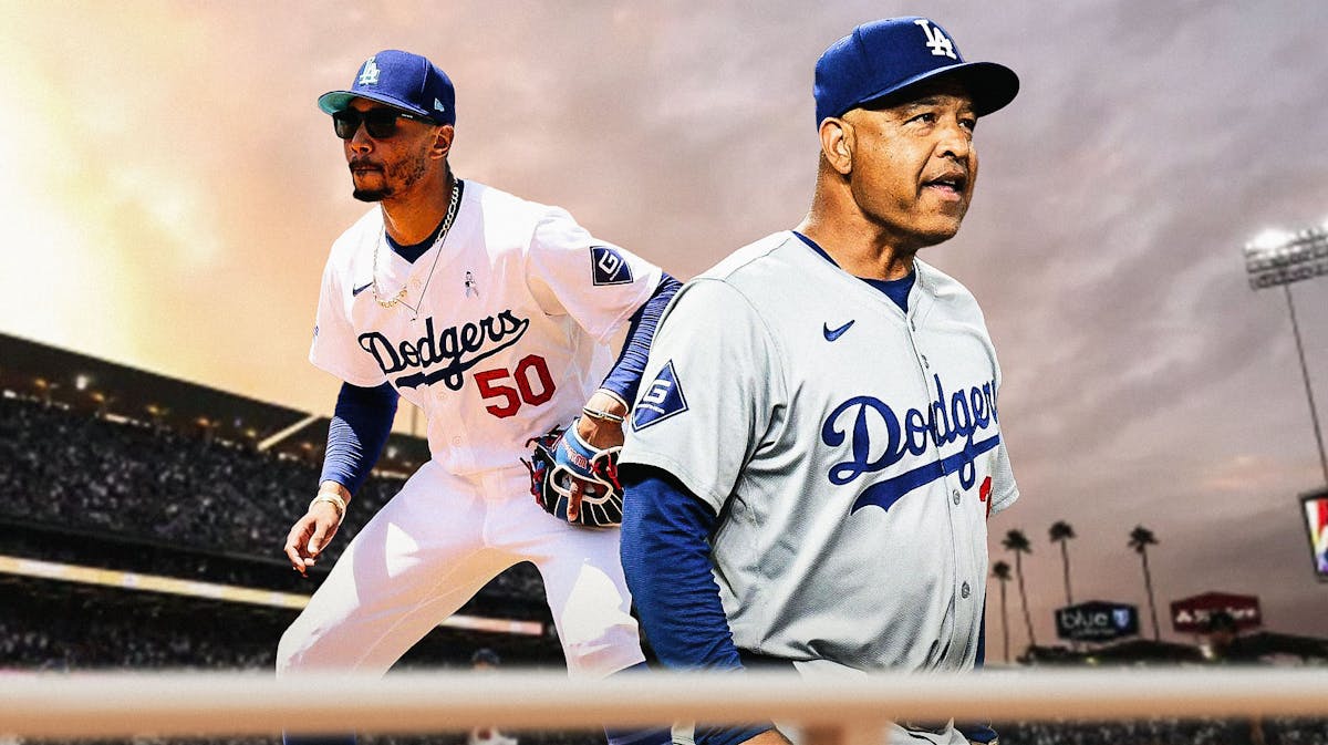 Mookie Betts (Dodgers) playing shortstop, Dave Roberts (Dodgers manager) and Dodger Stadium background