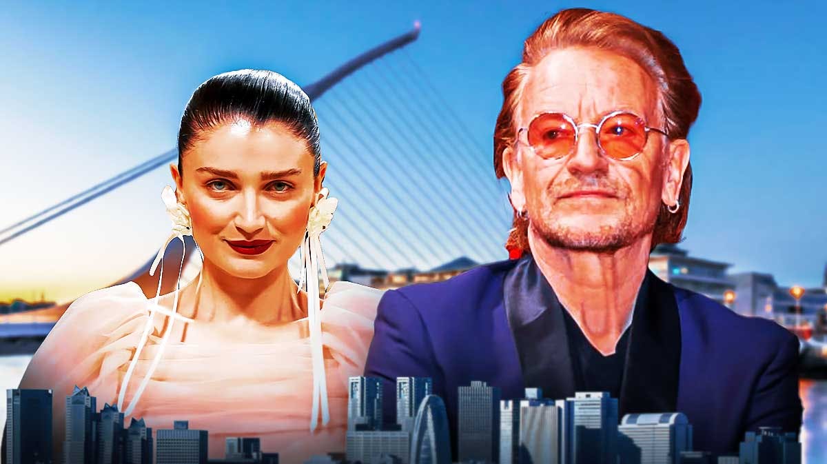 Eve Hewson next to her father, U2 lead singer Bono with Dublin, Ireland background.