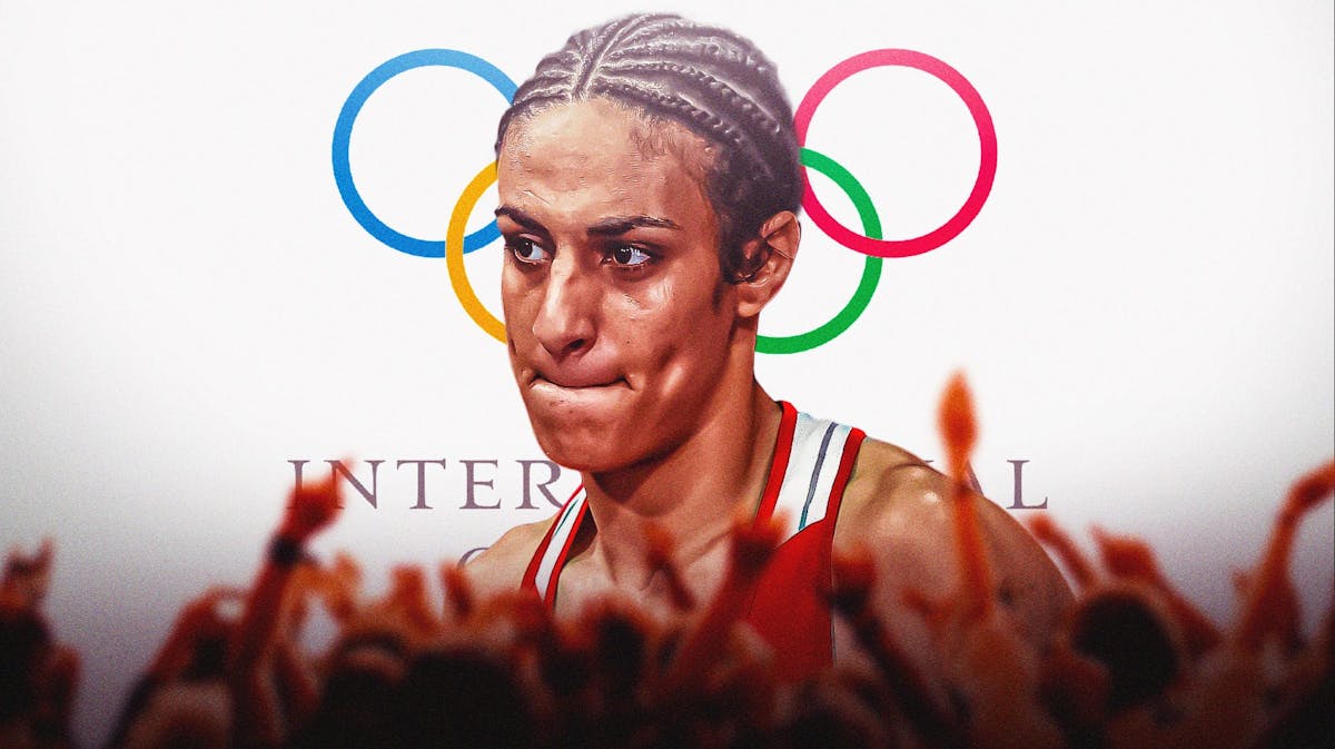 Boxer Imane Khelif in front of the IOC logo.