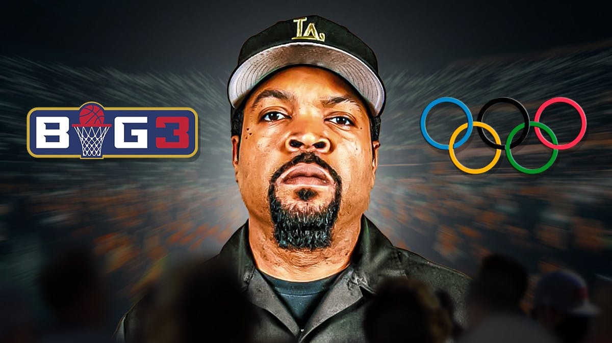 Ice Cube serious looking. Big 3 and Olympic logo in the background.