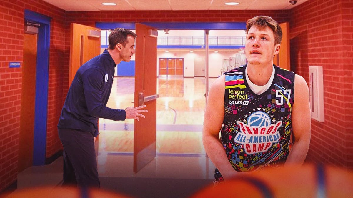 Duke freshman Kon Knueppel in a Duke shirt standing in an open gymnasium door opened by Duke head coach Jon Scheyer