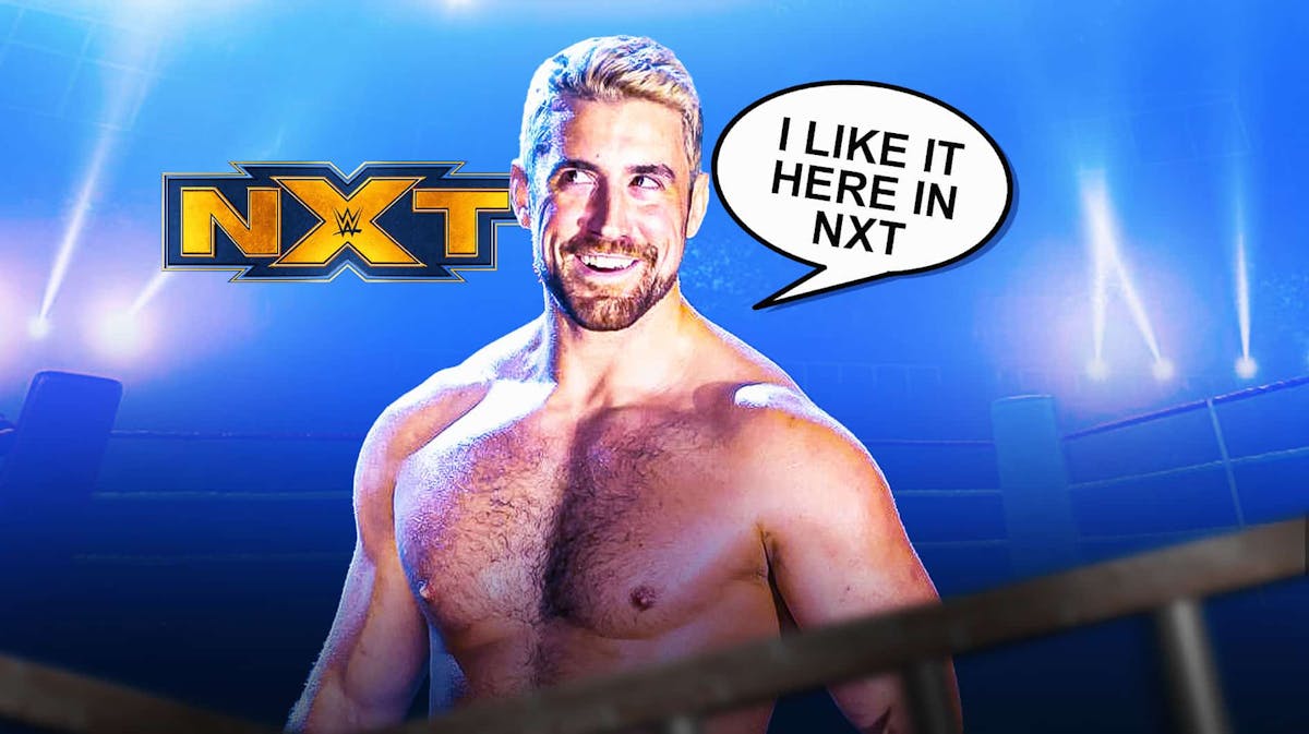 Joe Hendry with a text bubble reading "I like it here in NXT" with the NXT logo as the background.