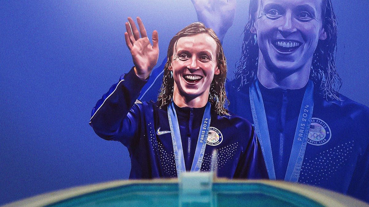 Katie Ledecky waving while wearing a gold meal
