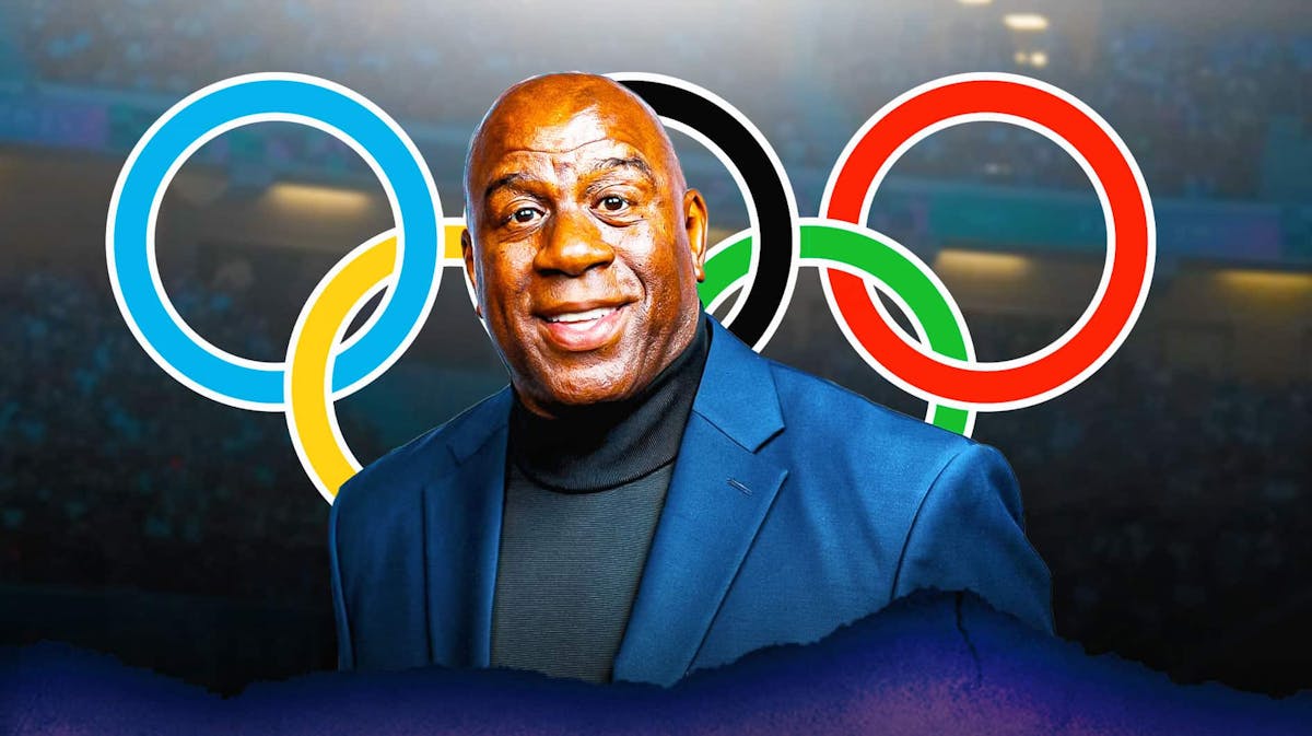 Magic Johnson next to Olympic Rings