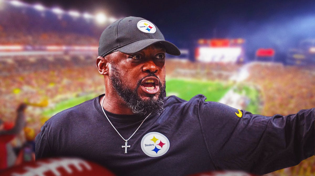 Mike Tomlin looking angry Steelers in the background.
