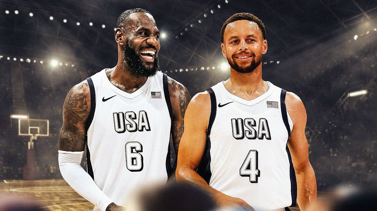 LeBron James and Stephen Curry smiling at each other wearing Team USA jerseys.