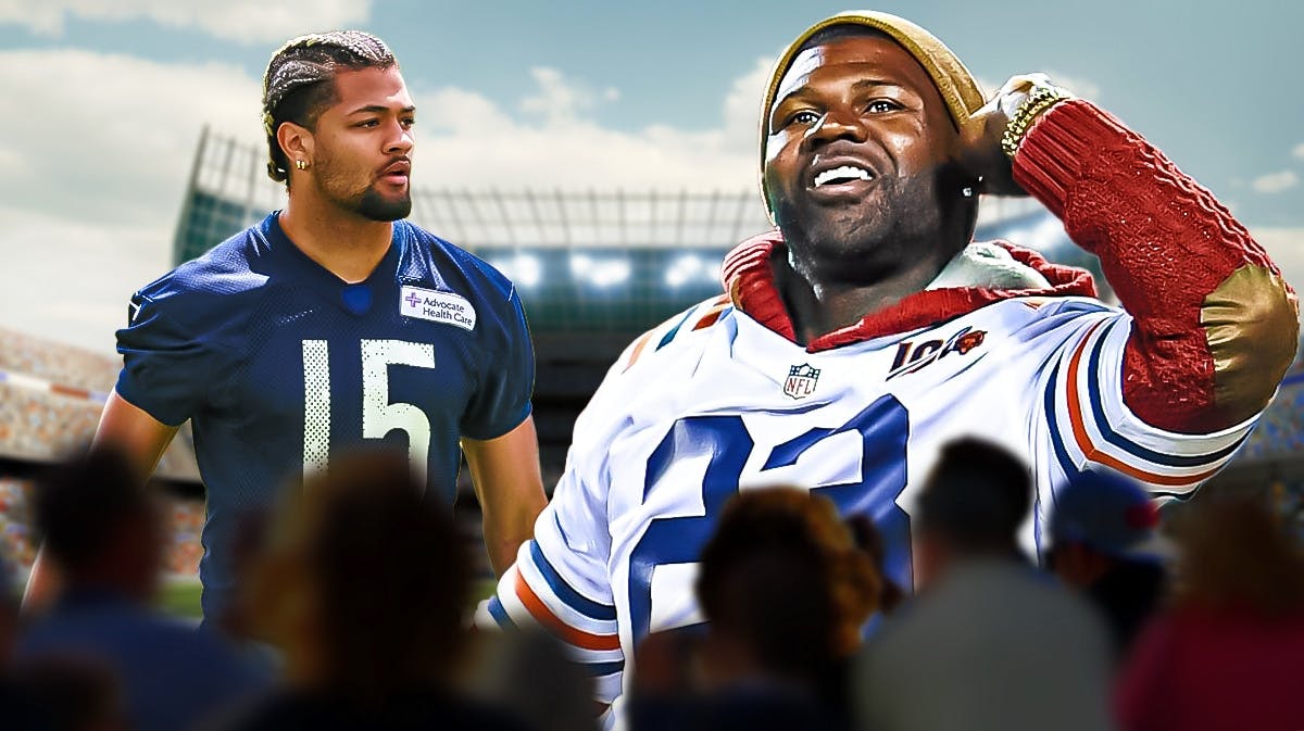 Bears rookie Rome Odunze looks at Texans fans standing next to Devin Hester