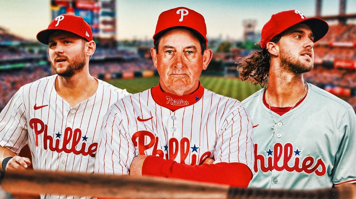 Phillies manager Rob Thomson and players Trea Turner and Aaron Nola