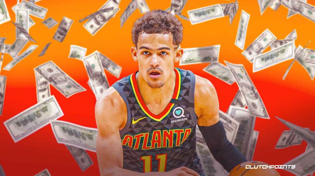 Trae Young with money around him