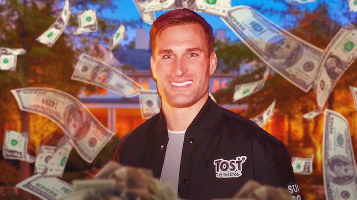 Kirk Cousins surrounded by piles of cash.