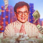 Jackie Chan surrounded by piles of cash.