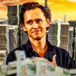 Tom Hiddleston surrounded by piles of cash.