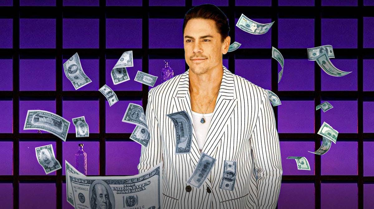 Tom Sandoval surrounded by flying cash.