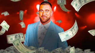 The Kansas City Chiefs' Travis Kelce surrounded by flying cash.