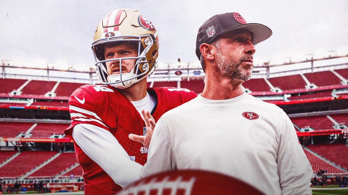 San Fransisco 49ers quarterback Sam Darnold and head coach Kyle Shanahan in front of Levi's Stadium.