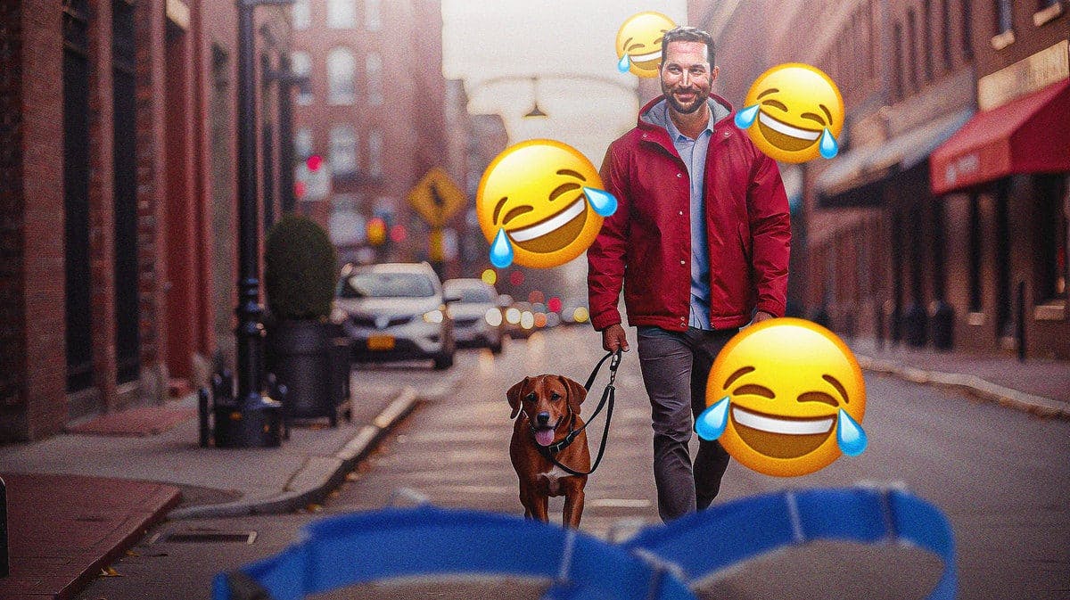 Adam Wainwright walking a puppy down the street, laughing emojis around him
