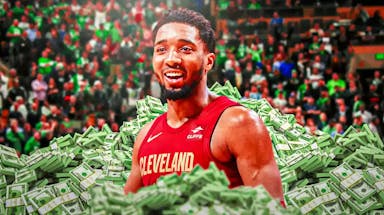 Donovan Mitchell surrounded by piles of cash.