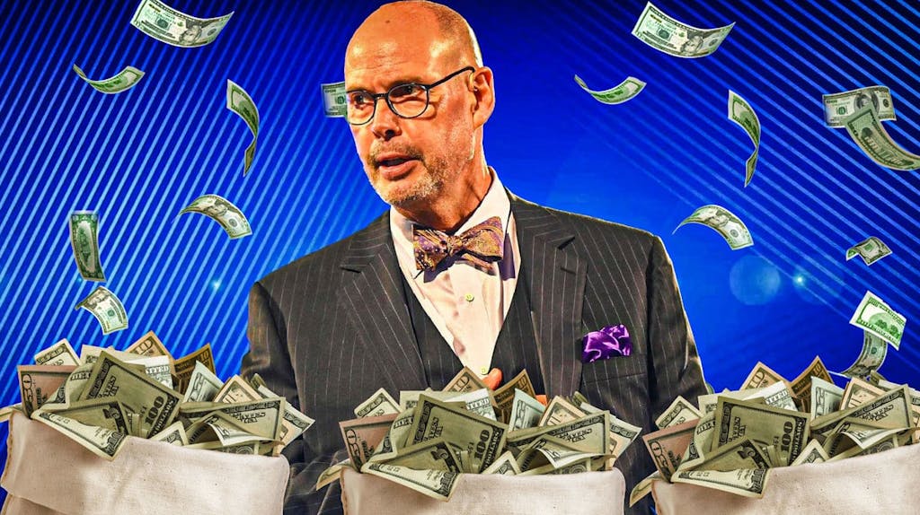 Ernie Johnson surrounded by piles of cash.