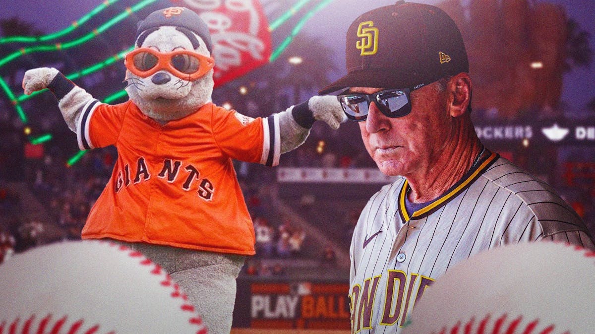 Bob Melvin of the Padres with the San Francisco Giants mascot