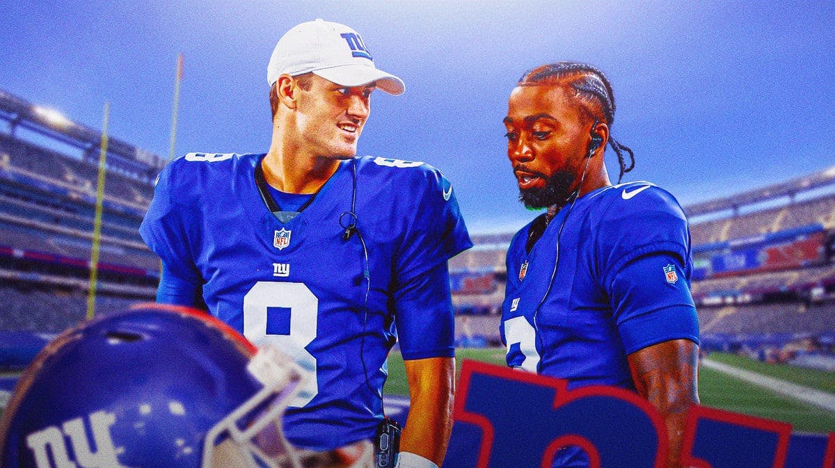 New York Giants quarterbacks Daniel Jones and Tyrod Taylor in front of MetLife Stadium.
