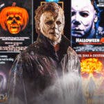 Michael Myers in front of all of the Halloween movie posters.