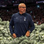 Jason Kidd as a coach surrounded by piles of cash