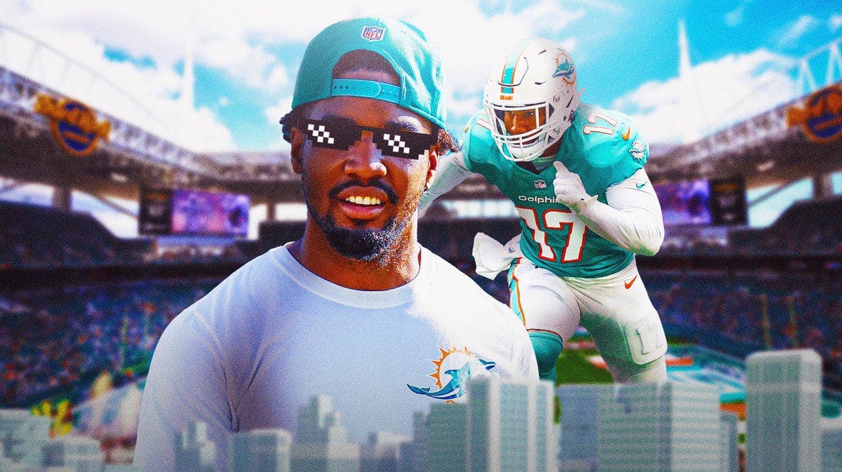 Action shot of Jaylen Waddle of the Dolphins with deal with it shades
