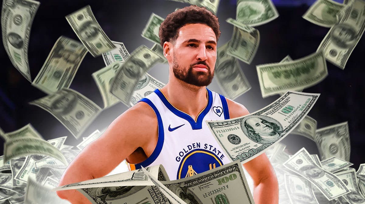 Klay Thompson surrounded by flying cash.