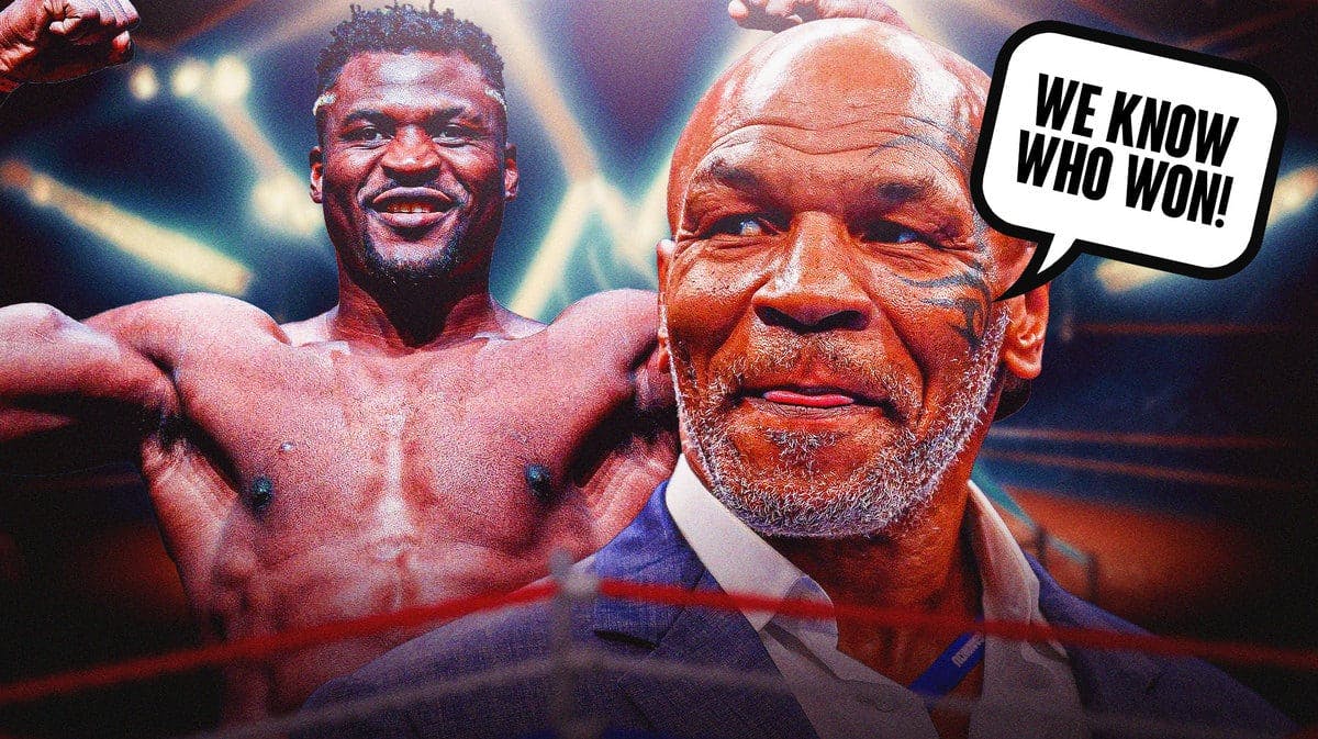 Francis Ngannou flexing while Mike Tyson shows pride
