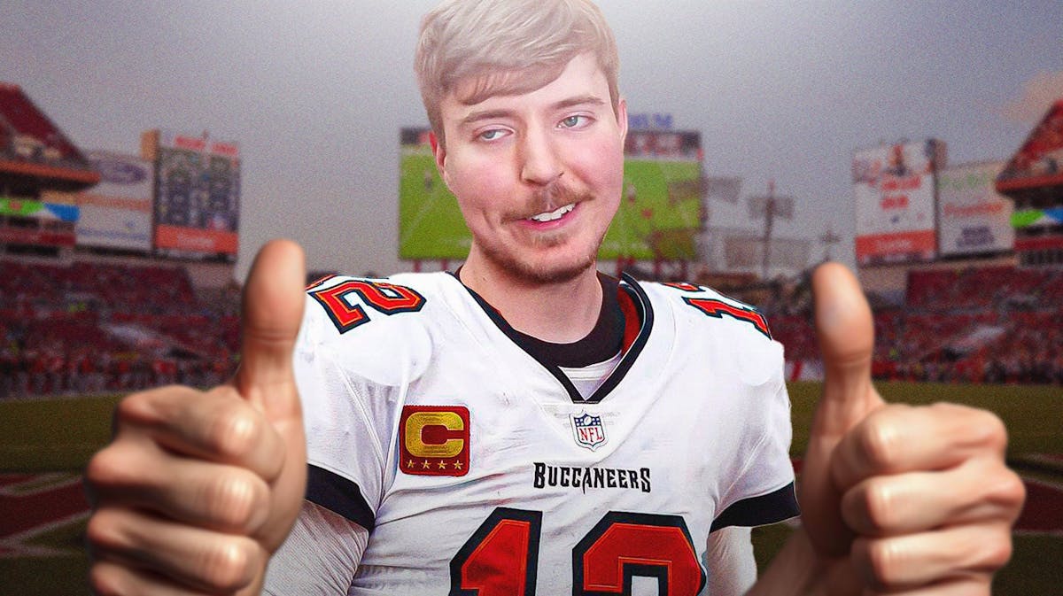 MrBeast with his thumbs up wearing a Buccaneers jersey