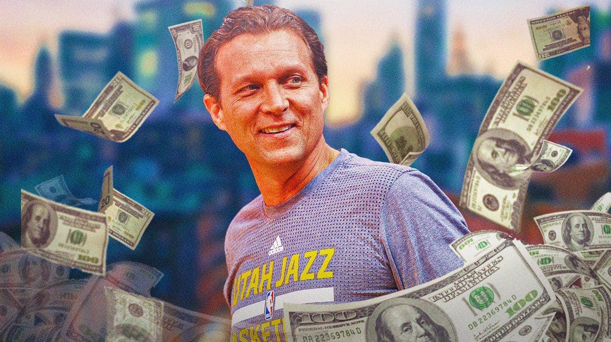Quin Snyder surrounded by cash.