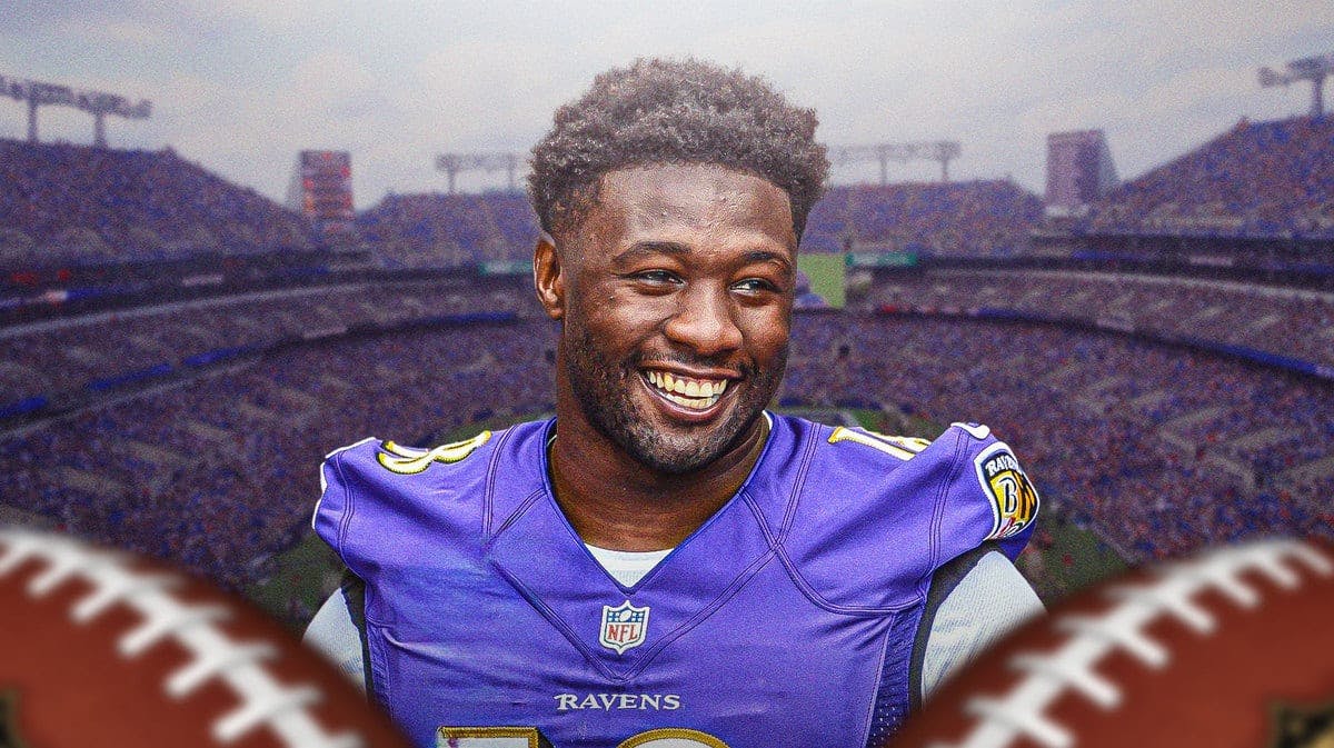 Roquan Smith smiling in a Ravens jersey