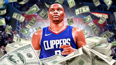 Russell Westbrook surrounded by piles of cash.