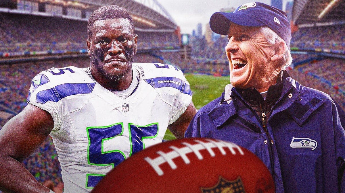 Frank Clark in a Seahawks uniform with Pete Carroll smiling next to him.