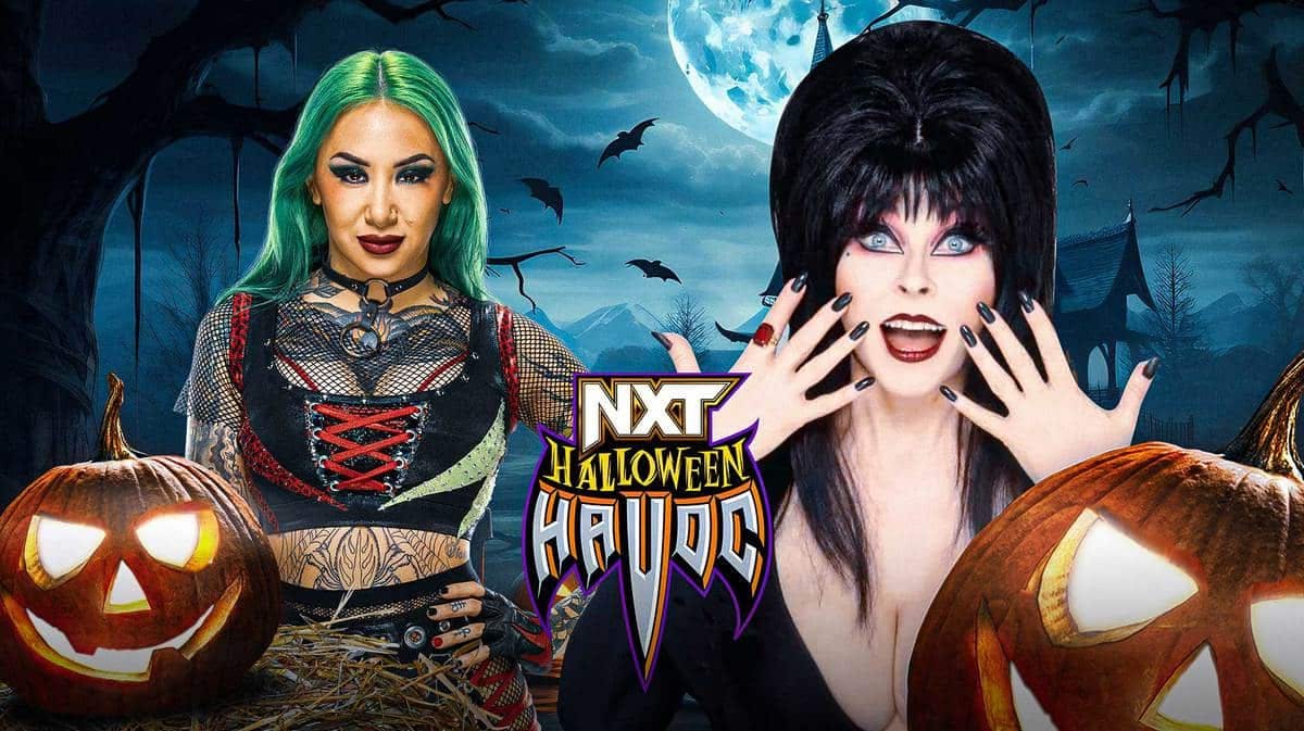 Shotzi Blackheart and Elvira standing in front of the NXT Halloween Havoc logo.