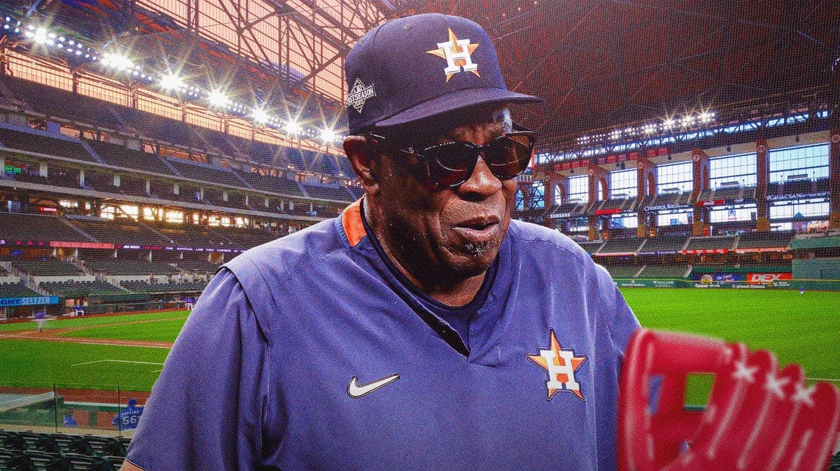 Dusty Baker with Globe Life Park in the background