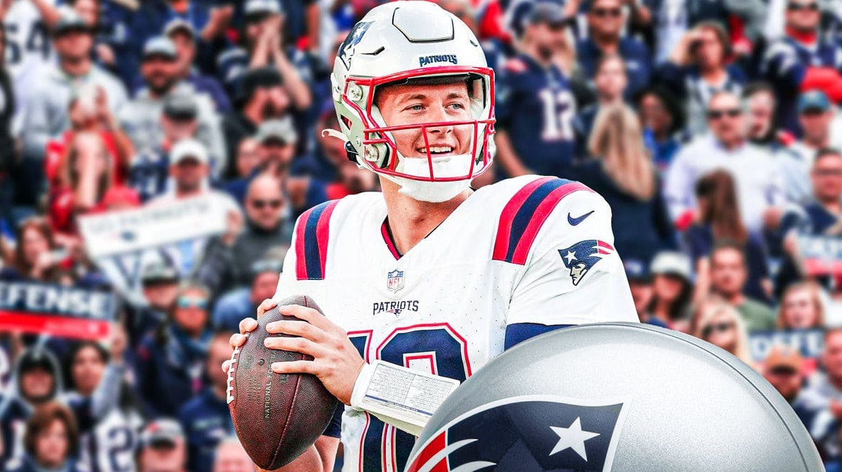 Mac Jones smiling in a New England Patriots uniform