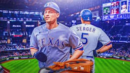 Rangers' Corey Seager with his back turned to viewer, so his jersey and number are showing. Globe Life Field background