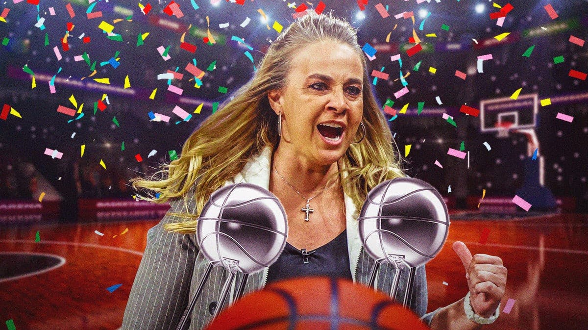 Becky Hammon celebrates after the Las Vegas Aces capture their 2nd WNBA title.