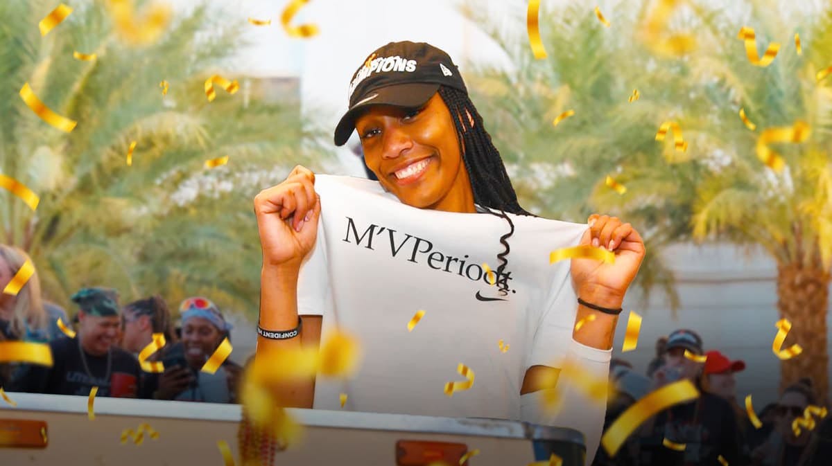 A’ja Wilson at the championship parade with focus on her MVPeriodt shirt.