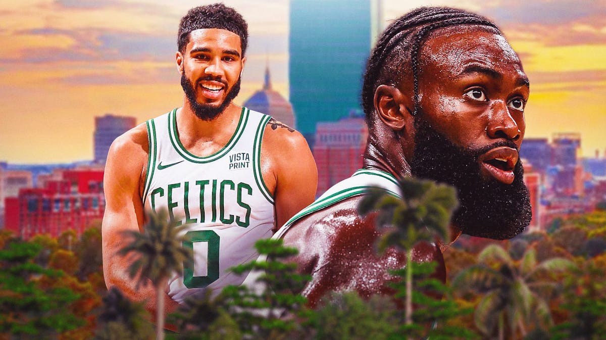 Jaylen Brown and Jayson Tatum looking hyped together on a Boston city skyline