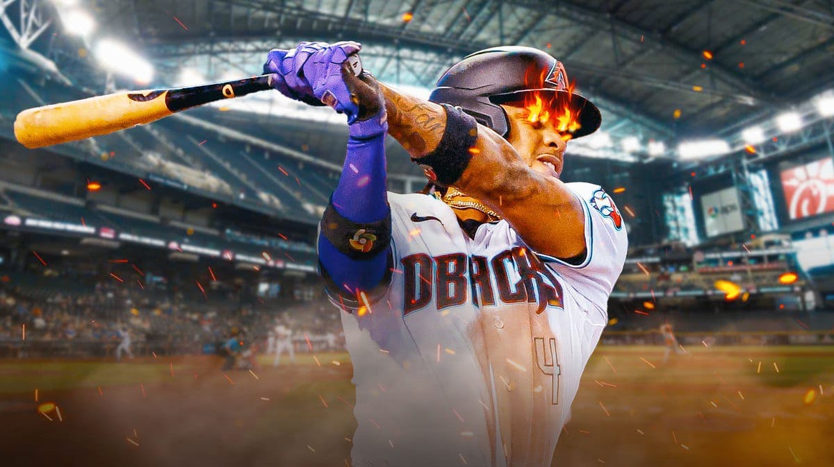 Ketel Marte of the Diamondbacks hitting a ball with his eyes on fire