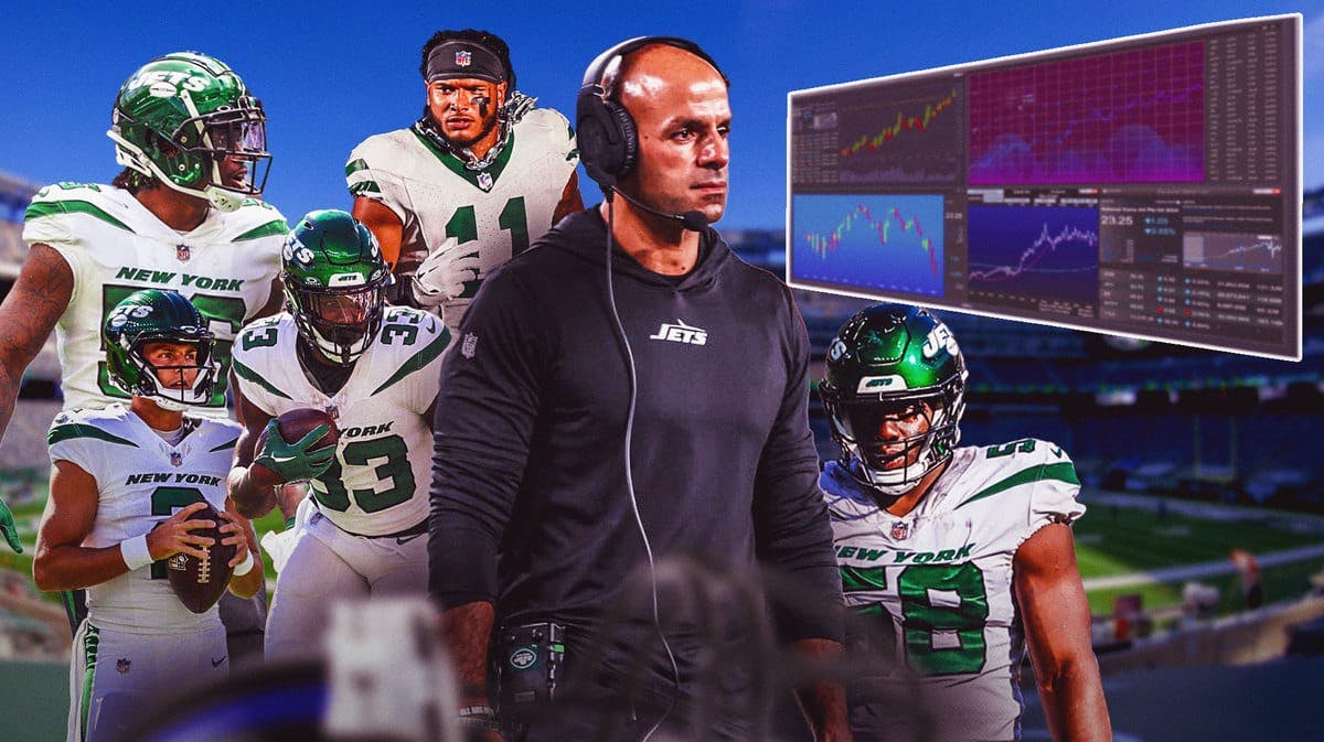Robert Saleh looking at the big board at stock market, surrounded by Quincy Williams, Zach Wilson, Jermaine Johnson, Dalvin Cook and Carl Lawson