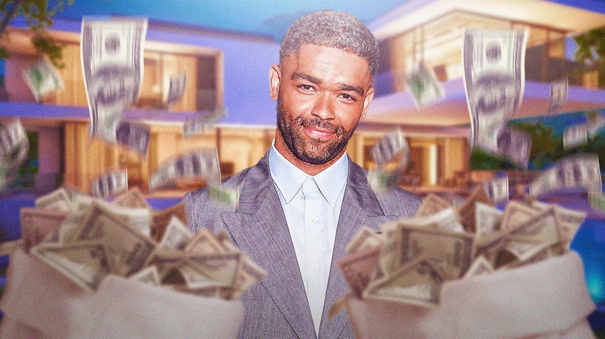 Kingsley Ben-Adir surrounded by piles of cash.